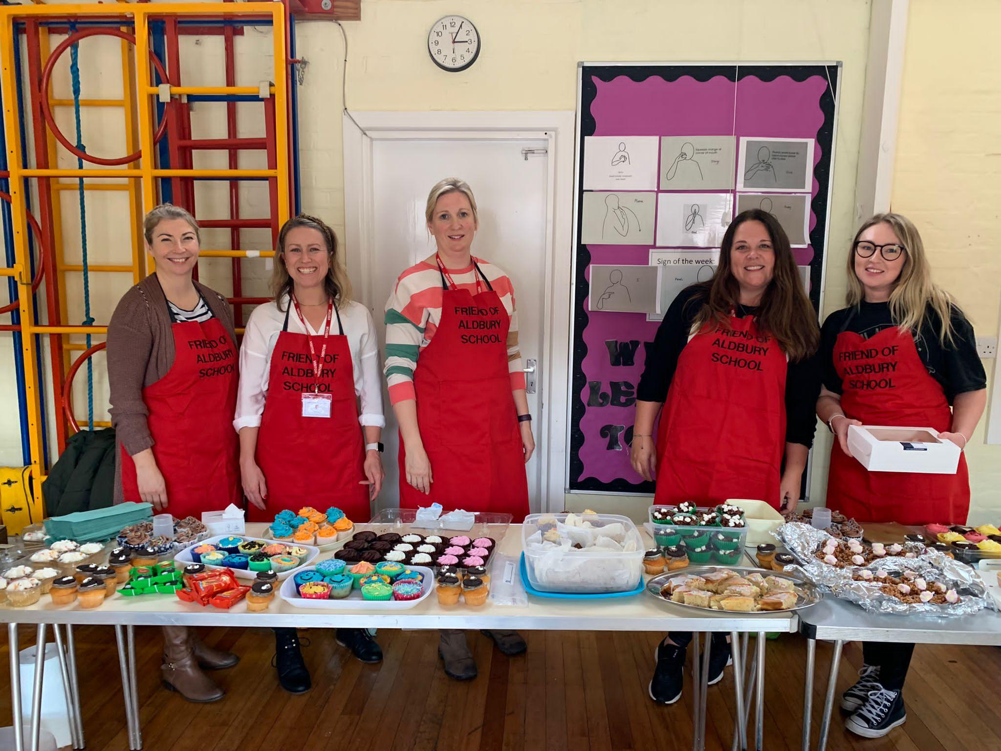 The FOAS team running a cake sale event